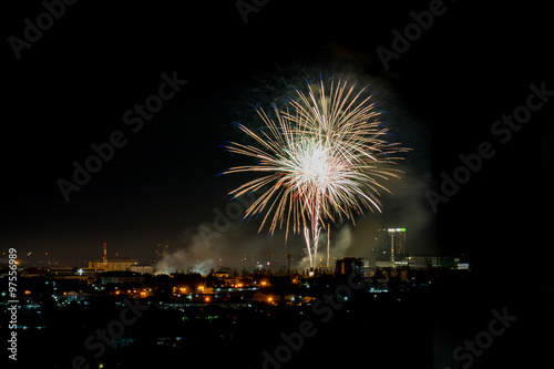 Brightly colorful fireworks and salute of various colors in the © Peerapixs