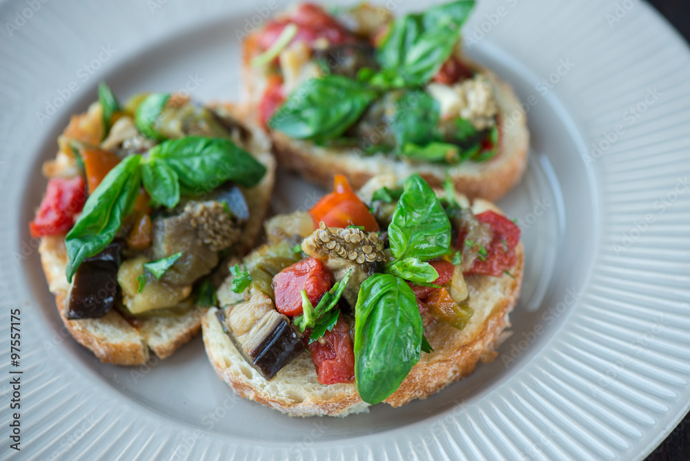 Toast with baked eggplant with tomatoes, garlic Toast with baked eggplant with tomatoes, garlic