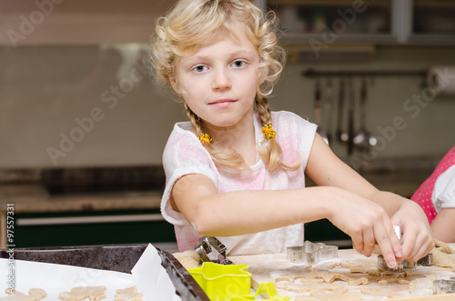 child helping in kitchen