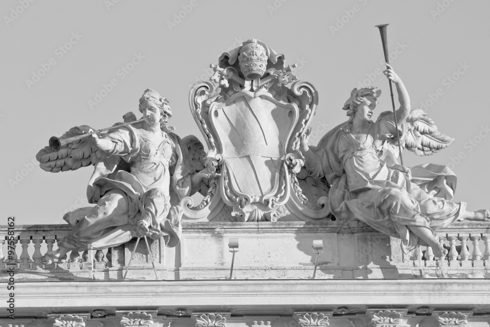 Fototapeta premium Close up detail of the statue on the top of Palazzo della Consulta in Rome, Italy. Black and white edited