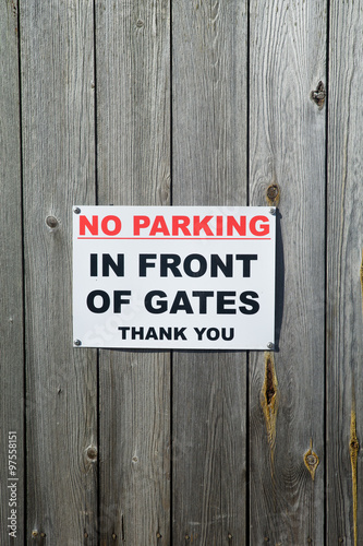 No Parking in Front of Gates sign