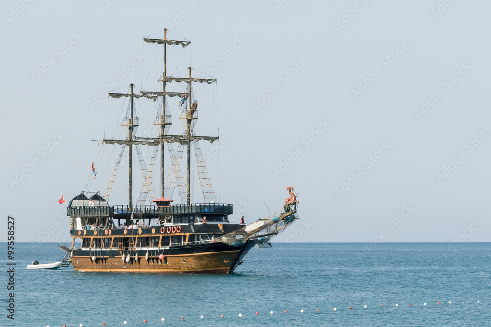 Pleasure boat on the background of the water surface
