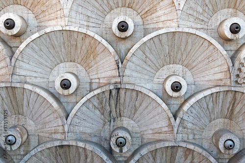 Installation of stone in the form of several circular wheel with holes in the middle