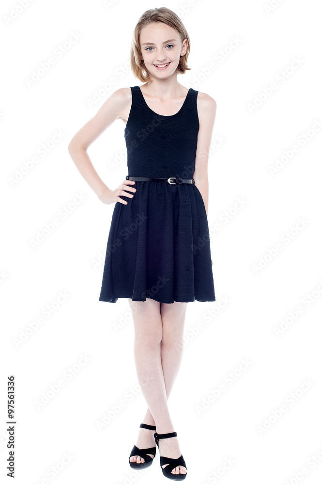 Elegant charming girl in sleeveless dress
