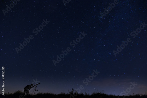 Man with telescope, star gazing