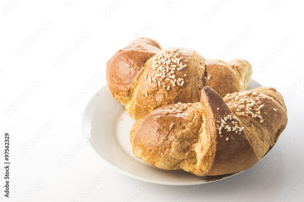 buttery croissants on a white background