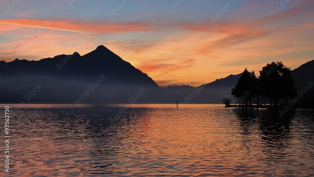 Colorful evening sky over Mt Niesen and lake Thun