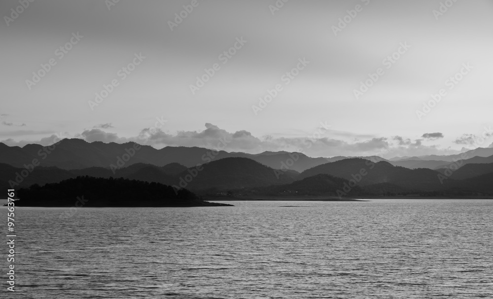 Nature landscape of mountain with lake. Black and white image