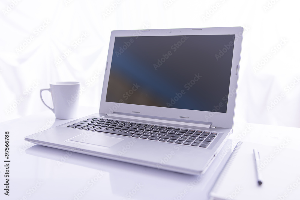 Office desk selective focus on laptop keyboard Office desk selective focus on laptop keyboard