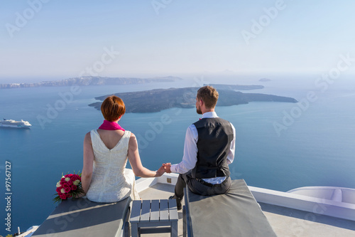 Young couple on sea background © Santorines