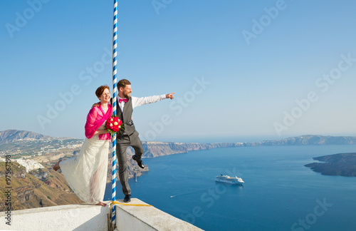 Young, cheerful couple on  island of Santorini