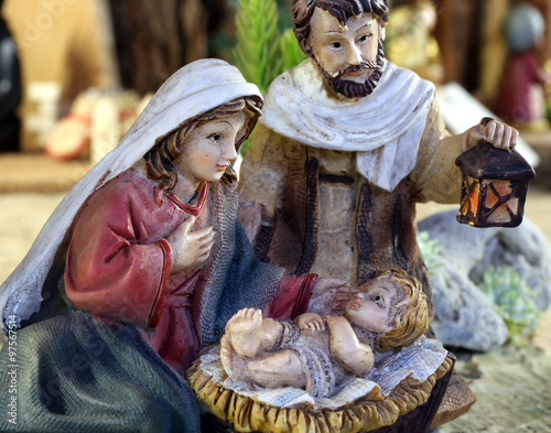 jesus child with Mary and Joseph with the lantern symbol of ligh