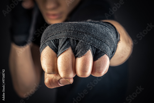 a boxer's hand in wrist wraps