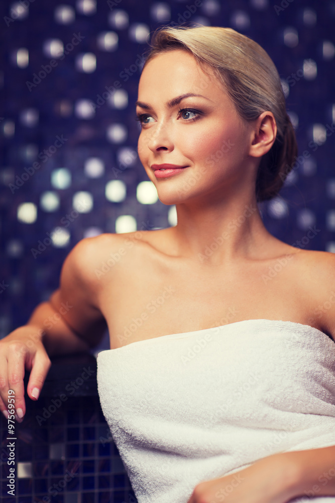 beautiful young woman sitting in bath towel Stock Photo Adobe Stock