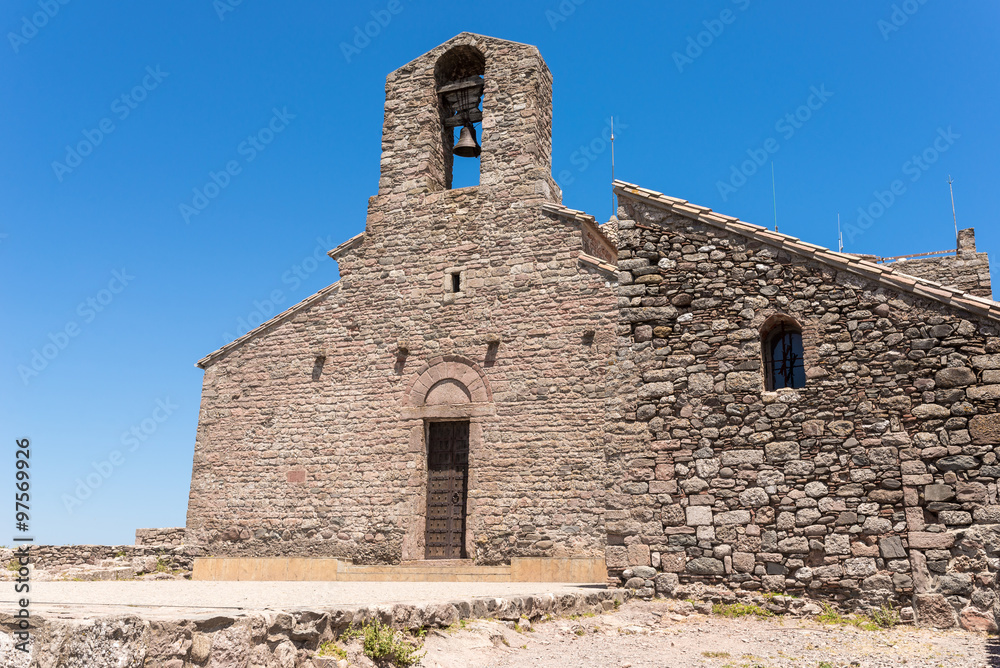 Monastery of Sant Llorenç del Munt, situated on top of La Mola, the summit of the rocky mountain massif. The original monastery built in the mid-11th century is Catalan Romanesque style