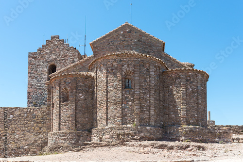 Monastery of Sant Llorenc del Munt, situated on top of La Mola, the summit of the rocky mountain massif. The original monastery built in the mid-11th century is Catalan Romanesque style photo