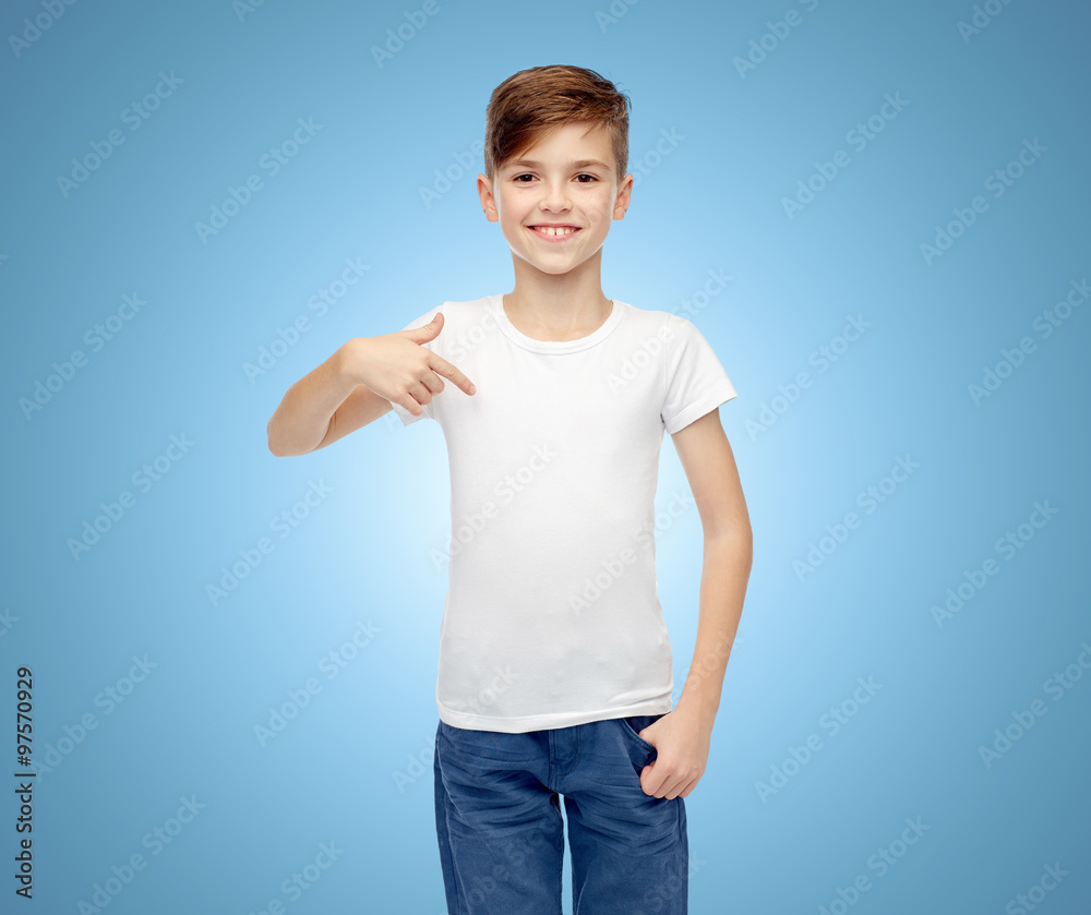happy boy pointing finger to his white t-shirt happy boy pointing finger to his white t-shirt
