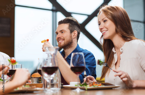 happy couple having dinner at restaurant © Syda Productions