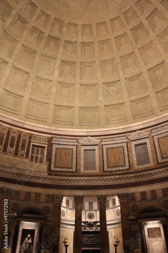 Pantheon interiors at night in Rome, with its typical coffered ceiling