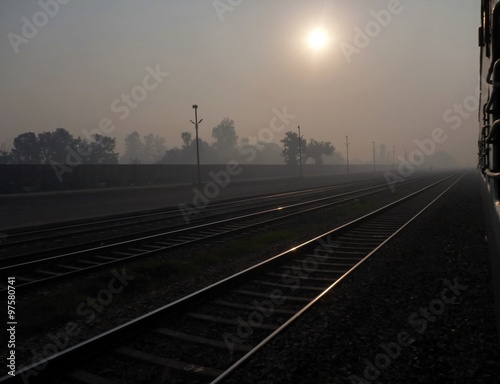 train tracks at the early morning mist