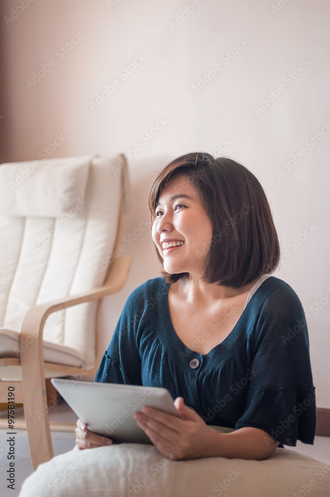 Young asian woman holding blank digital tablet. Young asian woman holding blank digital tablet.