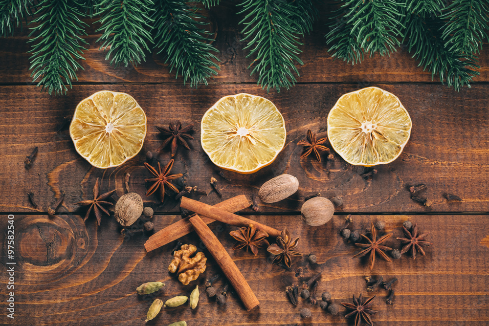 Christmas food decor and fir tree branch on wooden table Christmas food decor and fir tree branch on wooden table