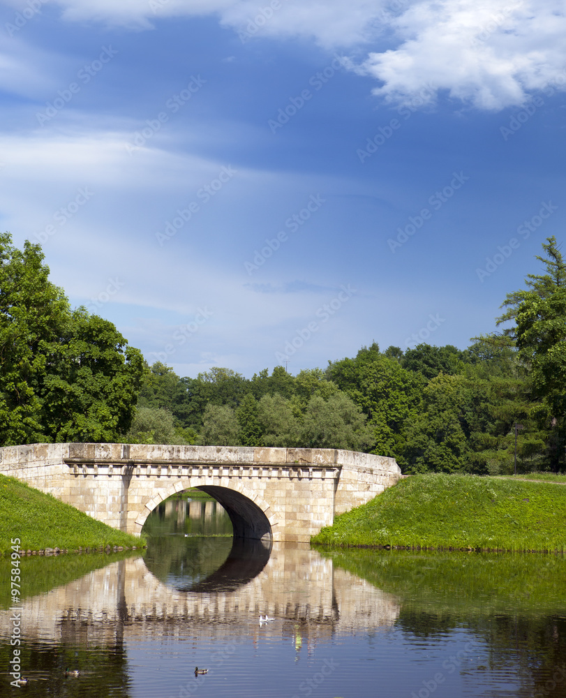 The bridge over a river in park