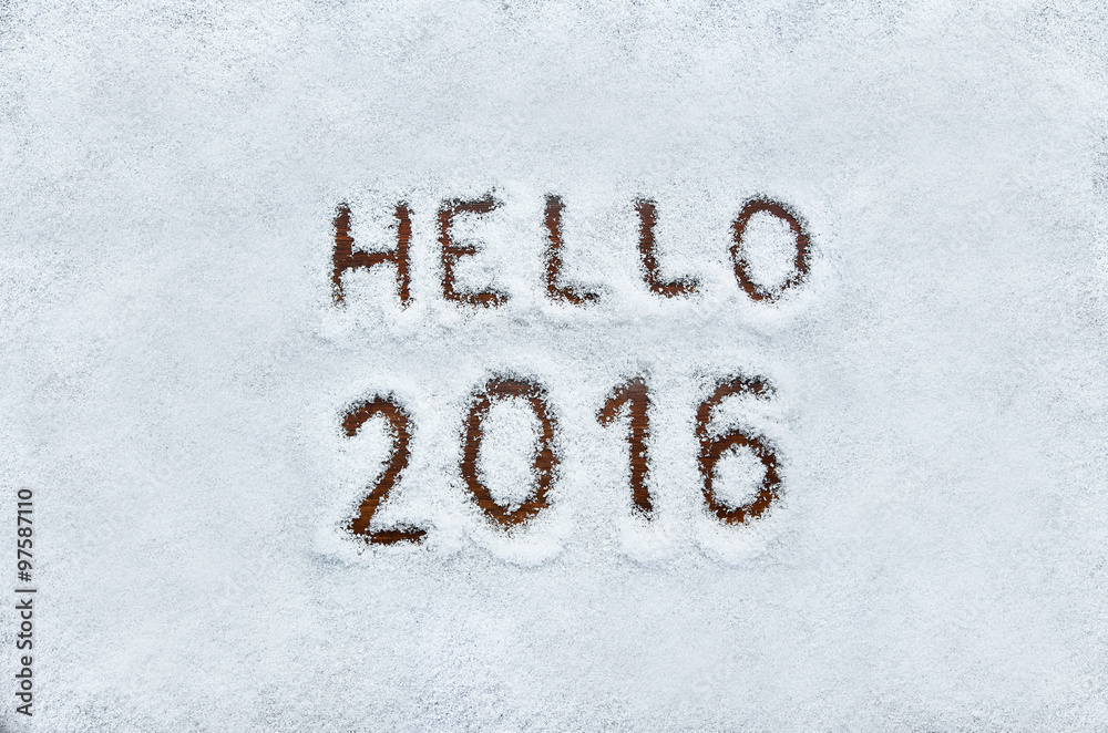 Text HELLO 2016 written on snow. Horizontal postcard with space Text HELLO 2016 written on snow. Horizontal postcard with space