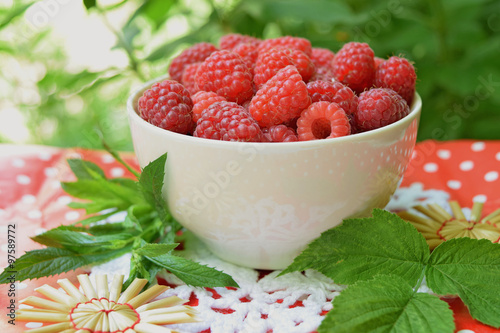 raspberry in cup