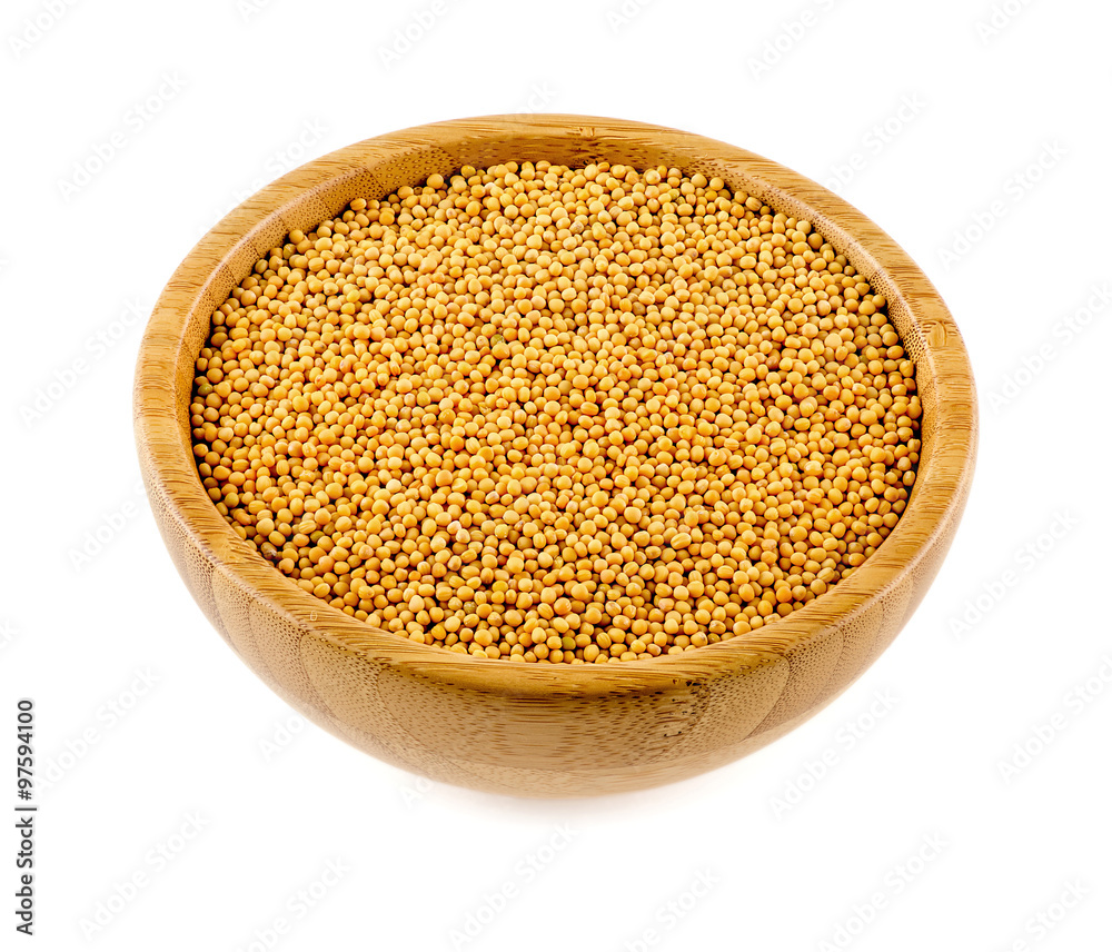 Macro of whole yellow mustard seeds Macro of whole yellow mustard seeds