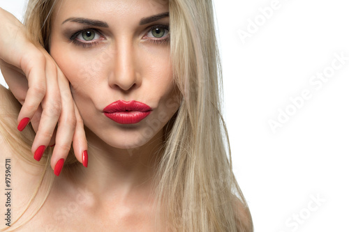 Close-up portrait of sexy woman lips with red lipstick and red m