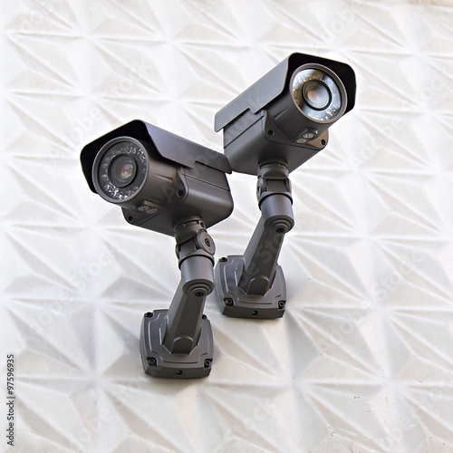 video surveillance camera on a wall of the building