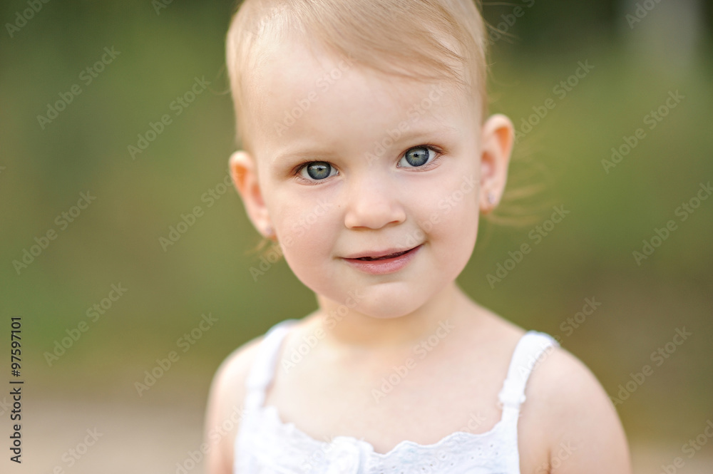 portrait of little girl outdoors in summer portrait of little girl outdoors in summer