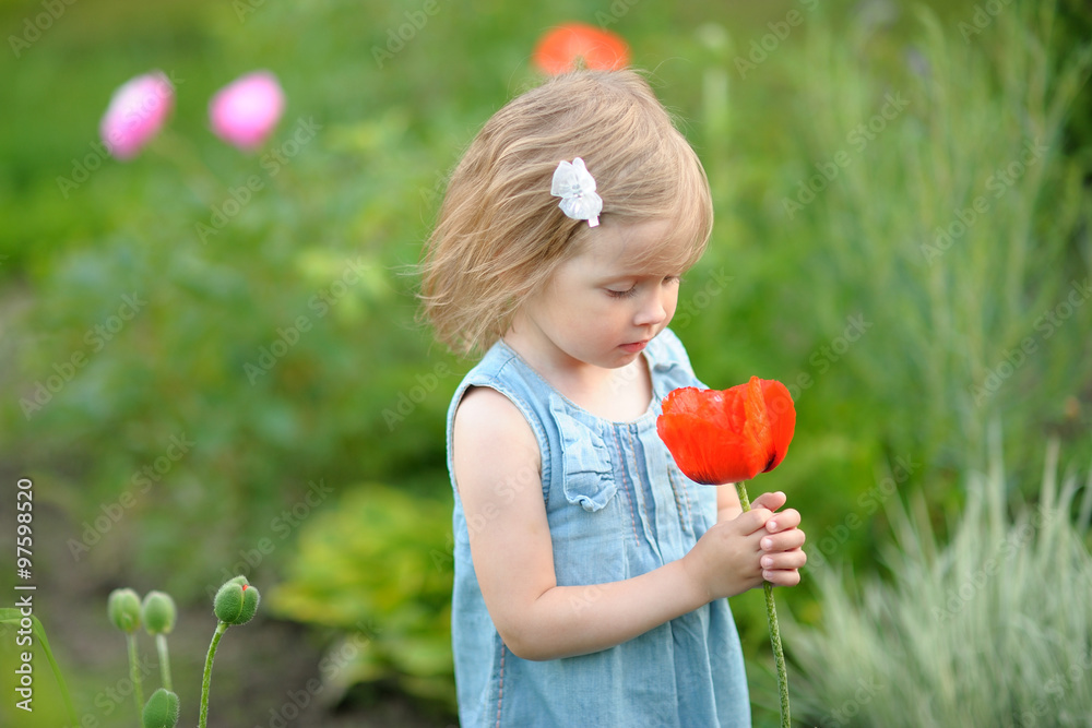 portrait of little girl outdoors in summer Stock Photo | Adobe Stock
