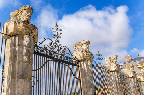 Vaux-le-Vicomte, France. Sculptural shapes on the fence of the estate photo