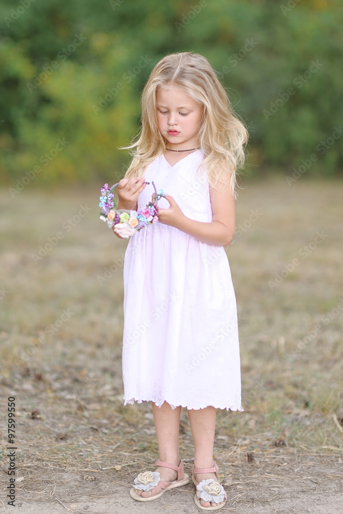 portrait of little girl outdoors in summer portrait of little girl outdoors in summer