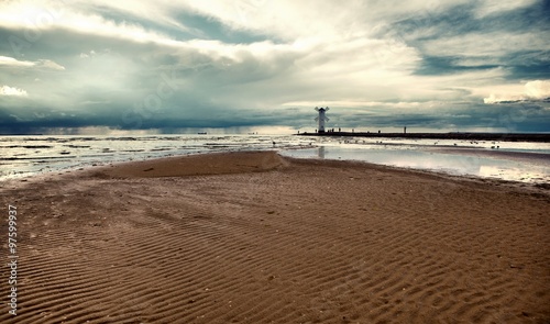 Lighthouse windmill Stawa Mlyny, Swinoujscie, Baltic Sea, Poland. photo