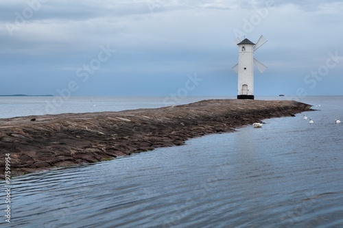 Lighthouse windmill Stawa Mlyny, Swinoujscie, Baltic Sea, Poland. photo