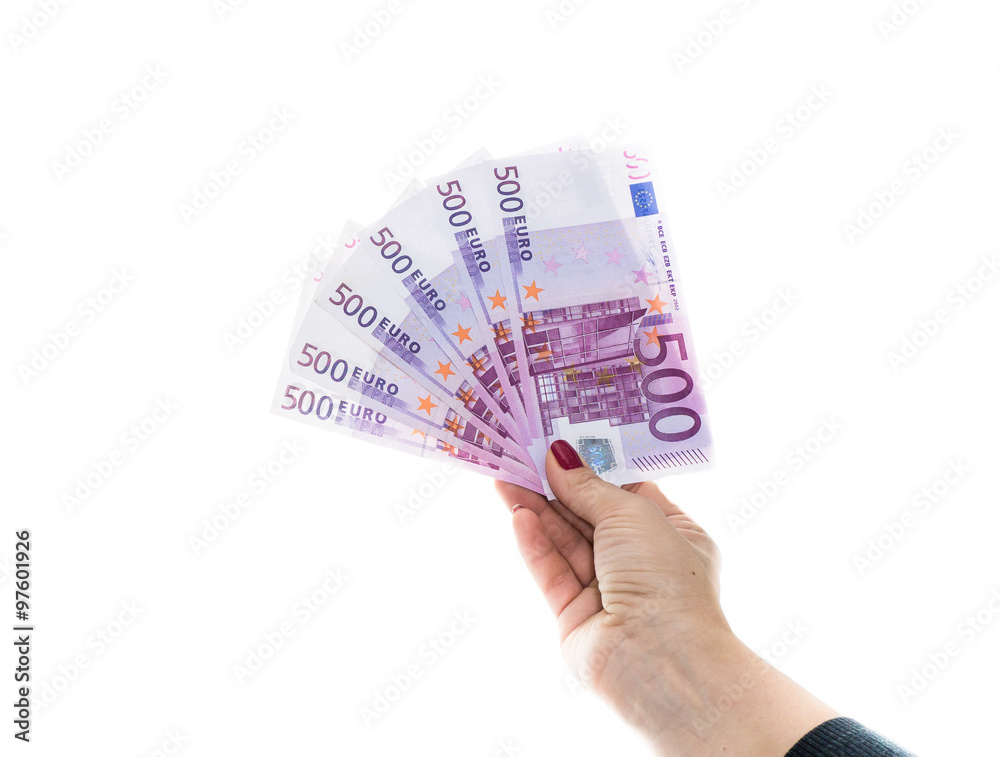 hand holding 500 euro money isolated on white background hand holding 500 euro money isolated on white background