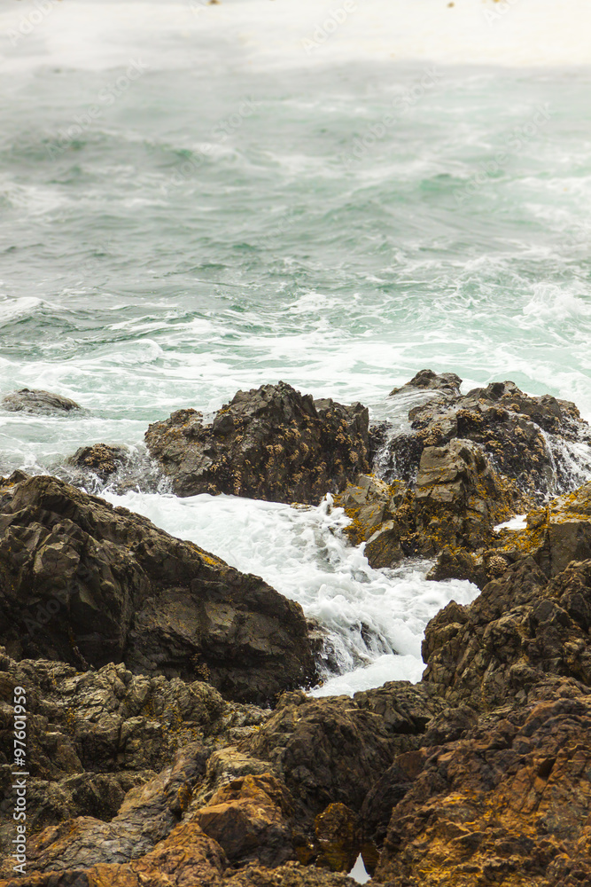 Rocky Coastline of Pacific Ocean where Waves Hit Shore Rocky Coastline of Pacific Ocean where Waves Hit Shore