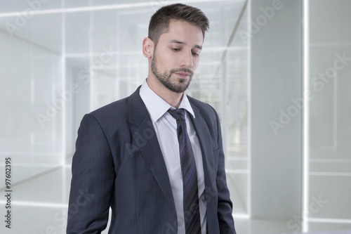 Businessman posing indoors 