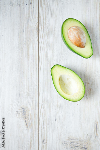 avocado on wooden surface