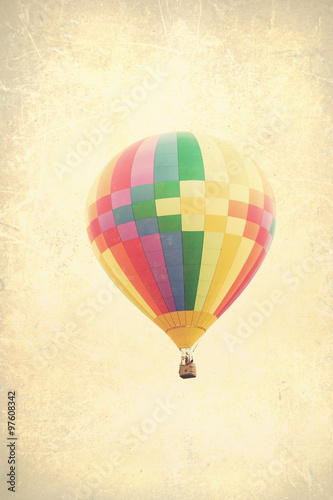 Vintage textured hot air balloons in flight