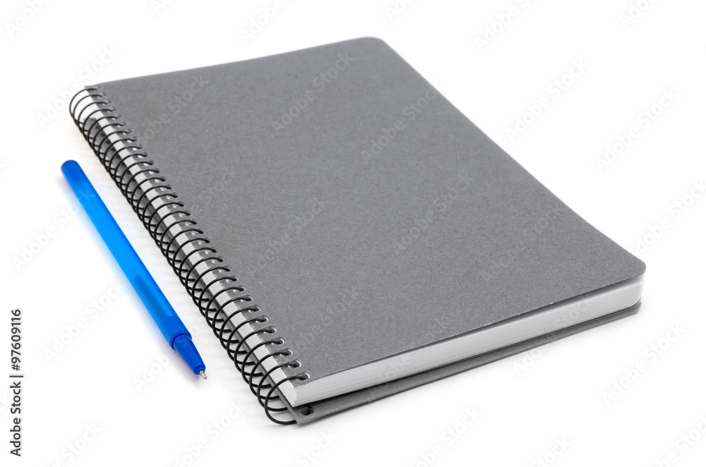 spiral red notebook and pen isolated on white spiral red notebook and pen isolated on white