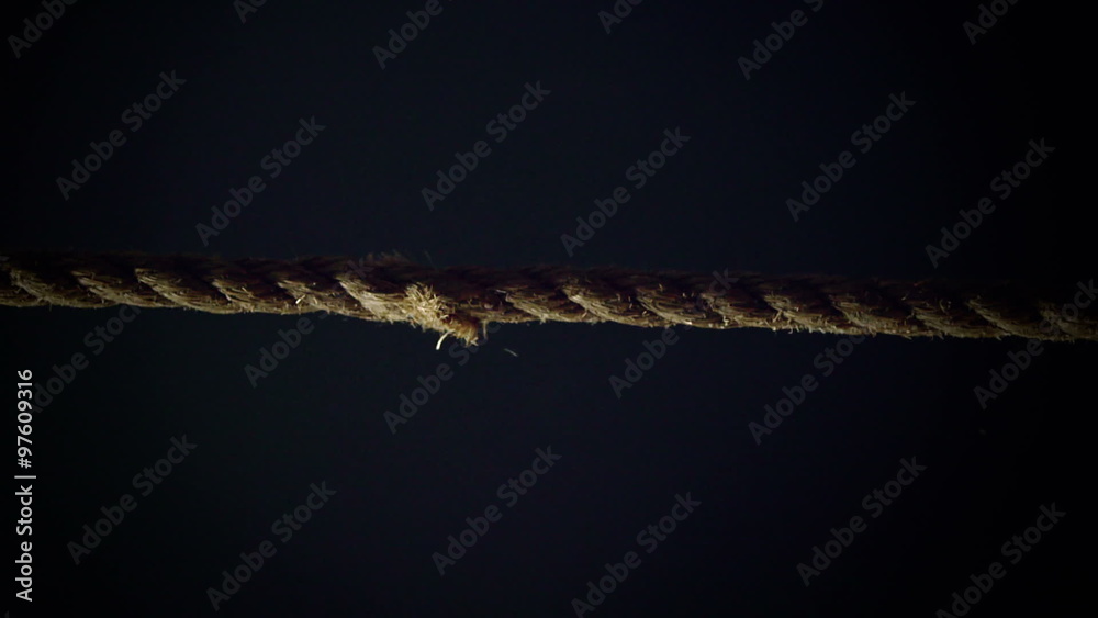 Tension of a Panic Attack Illustrated with Breaking Rope in Super Slow Motion