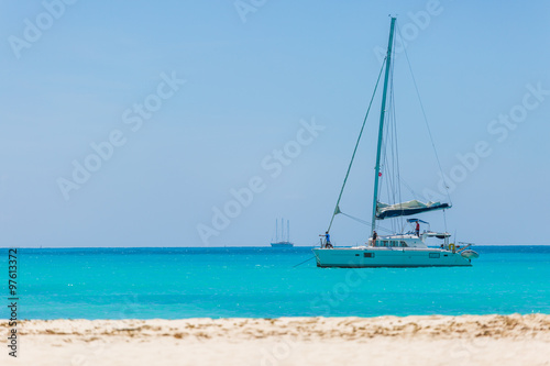 Catamaran at the beach © PhotoSerg