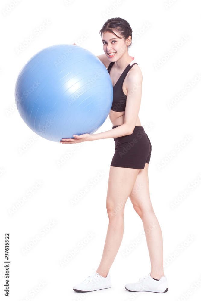Young woman doing exercises with fitness ball. Young woman doing exercises with fitness ball.