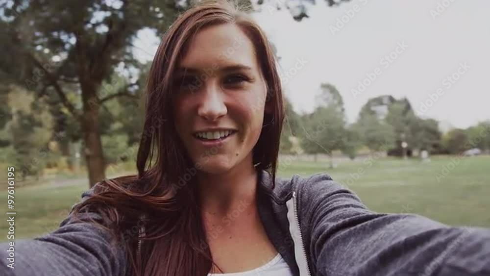 A beautiful girl spinning circles in slow motion, first person point of view