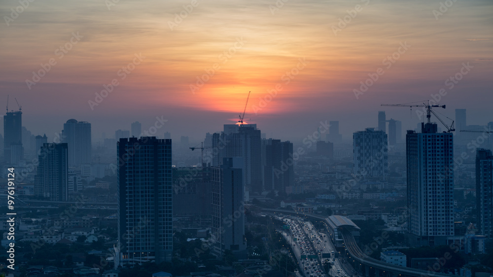 view of Bangkok skyline at sunrise.