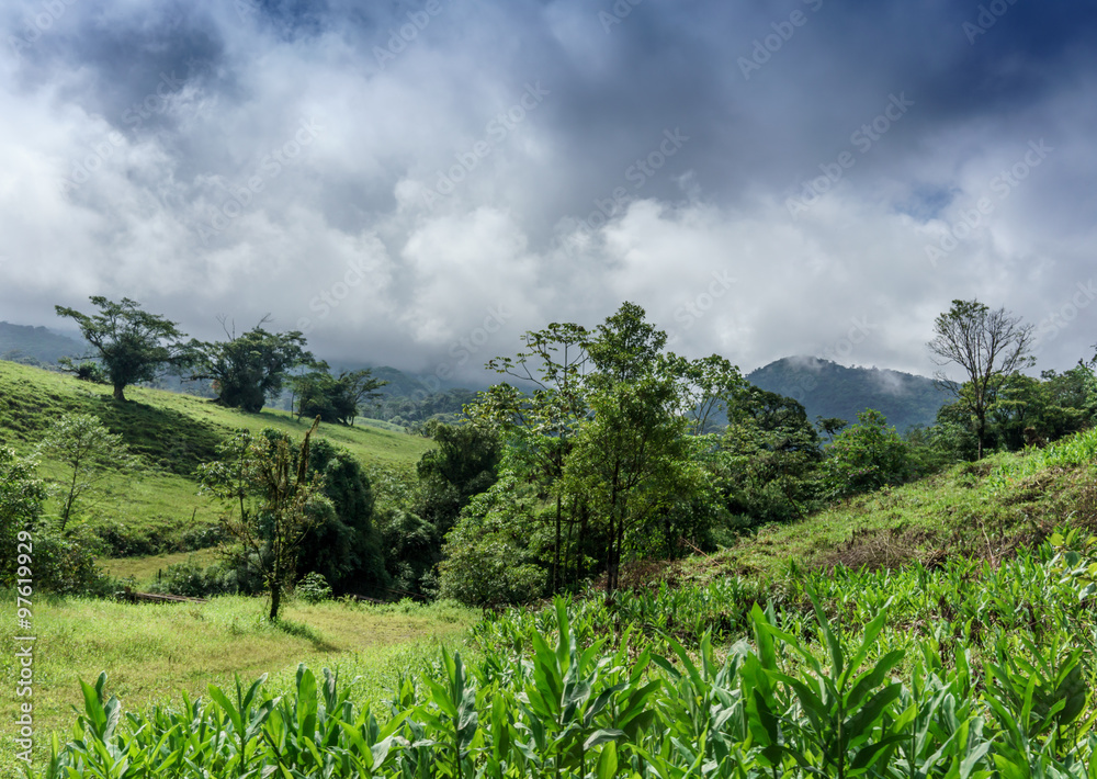 Scenic view of mountains against cloudy sky, Costa Rica Scenic view of mountains against cloudy sky, Costa Rica
